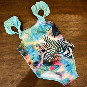 Beautiful zebra swim suit with ruffle detail
